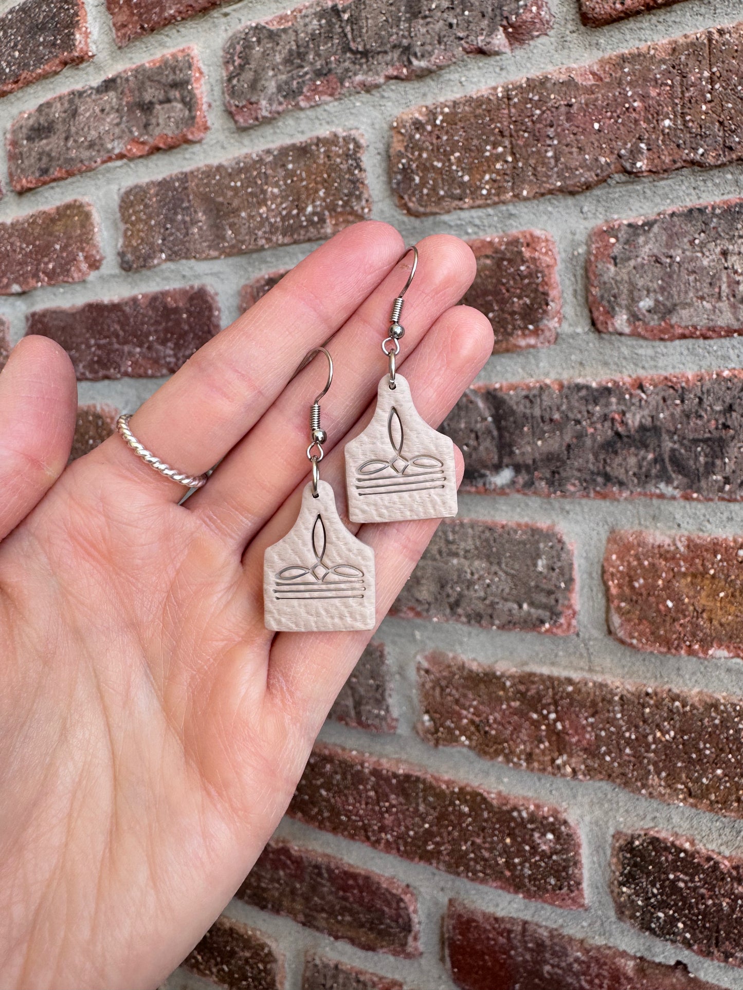 Boot Stitch Cow Tag Earrings